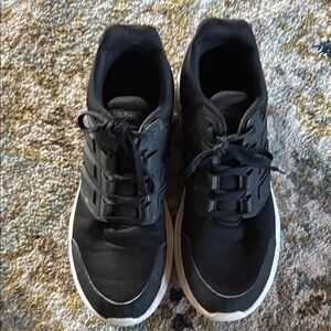 Adidas Black Sneakers with Sleek Design